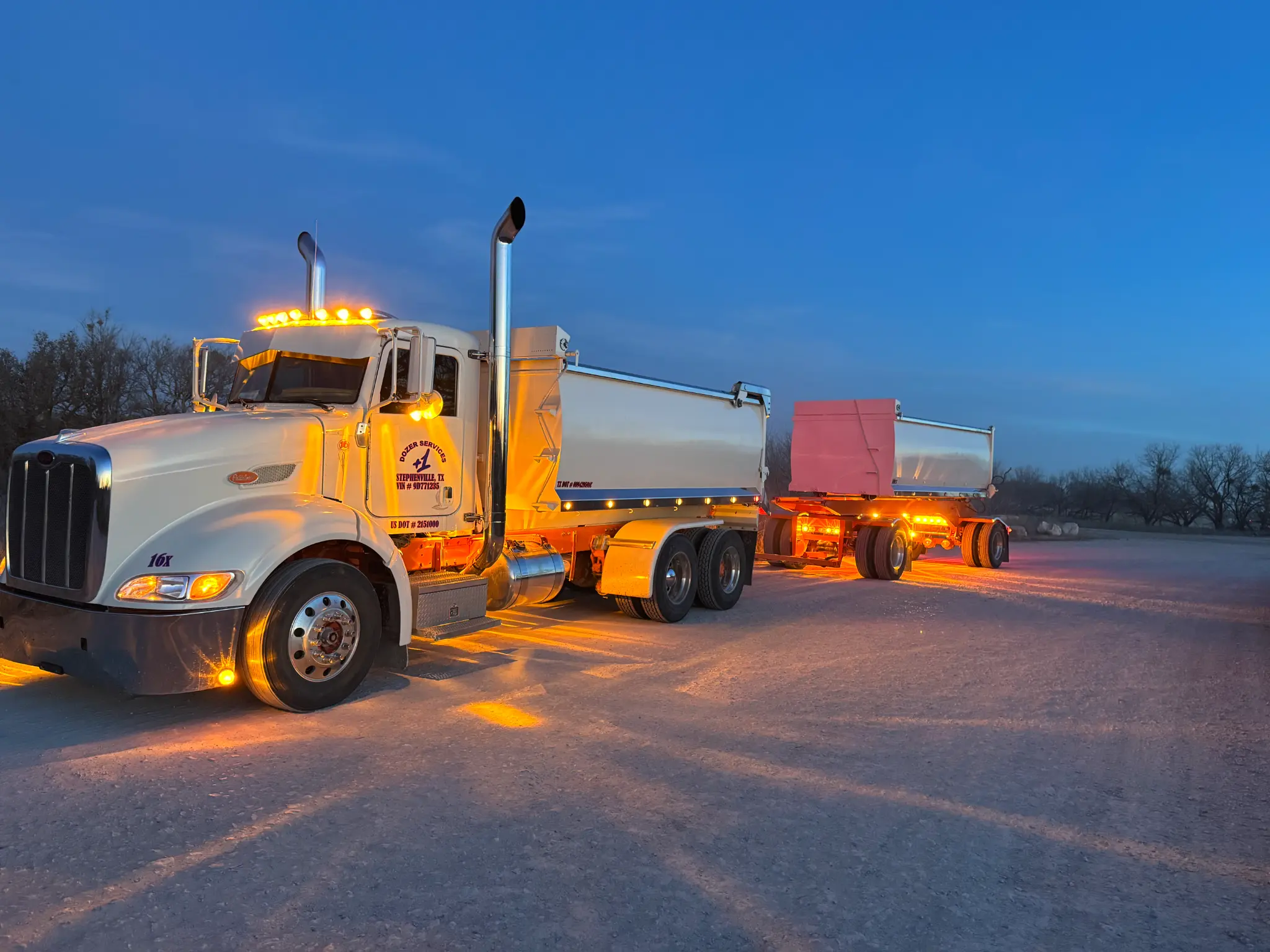 Transfer dump truck delivering aggregate materials in Stephenville Texas